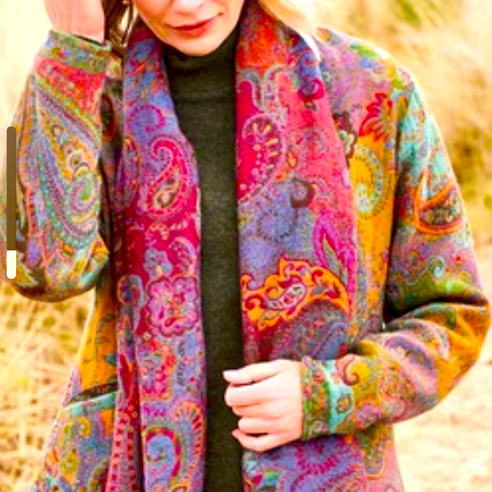 Imitation cashmere coat.  Multiple rich colored fabric with pockets.